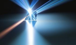 Künstlerische Darstellung der Wechselwirkung zwischen Kristall und Licht
